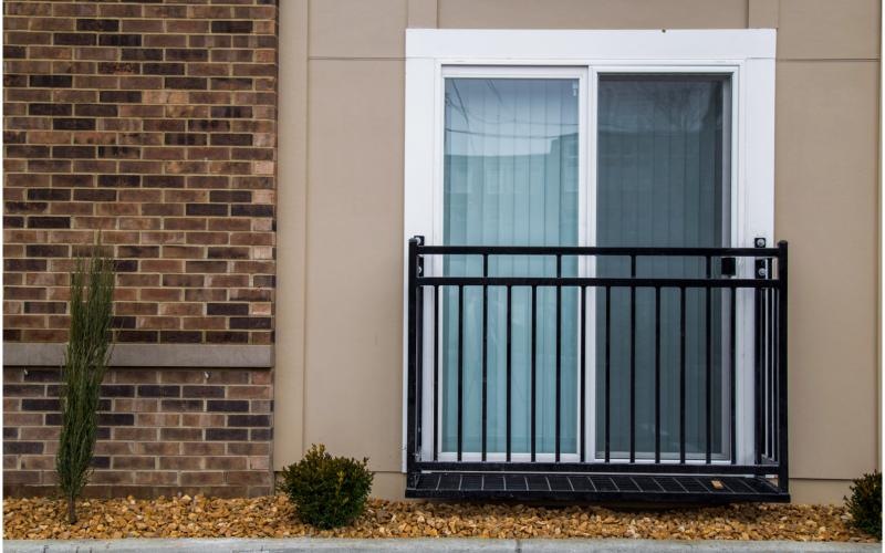 a gate in front of a building